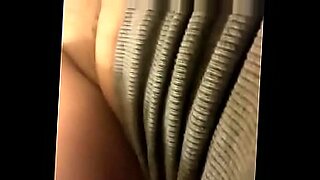 asian girl in black lingery masturbating with vibrators on the couch